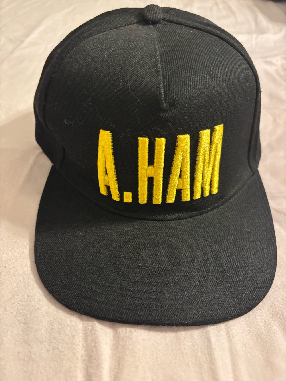 Hamilton Black Snapback Hat with Yellow A.HAM Embroidery